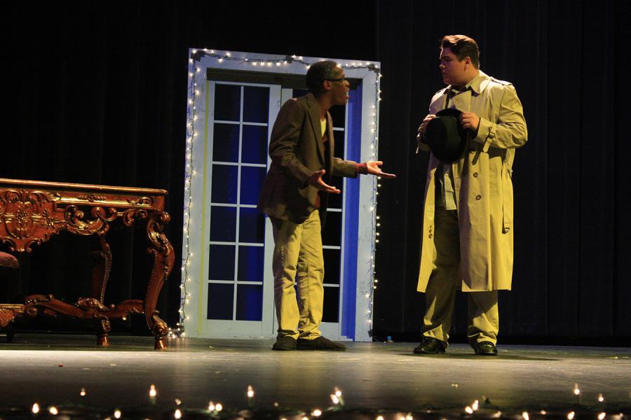 Scrooge ( Justin Aloze) talking his colleague, Bob Cratchit (Kyle Pearson)