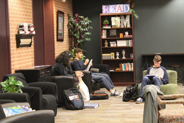 AcaDec students study in the library