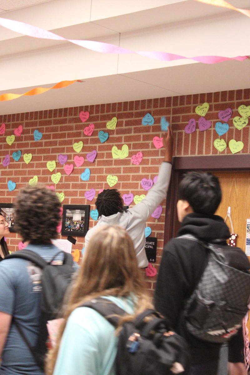 Student grabs his heart off the wall during passing period