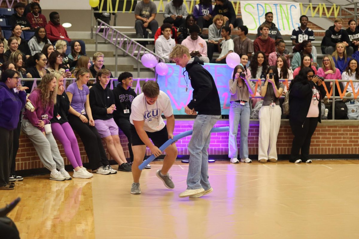Two students participate in the games at the March 10 pep rally