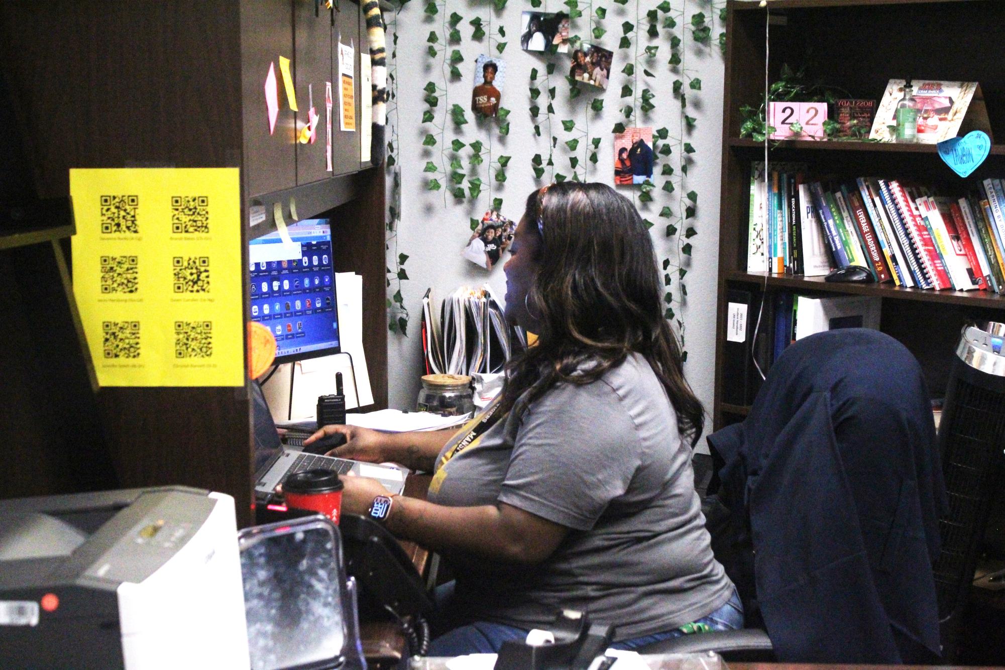 Dr. Lawson responds to an email in her office.